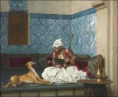 Représentant un musulman dans son salon, soufflant une bouffée provenant du narguilé à son chien, un lévrier arabe, ''Une plaisanterie'' est une toile exécutée en 1892 par un peintre académique, et orientaliste qui se nomme :