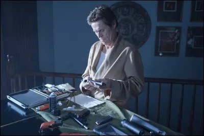 Dans quel film Willem Dafoe est-il le mentor d'un tueur à gages dont la tête est mise à prix ?