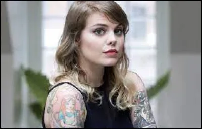 Complétez le titre de cette chanson : "T'es...