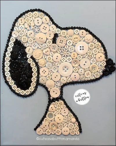 À quelle race appartient le chien Snoopy ?