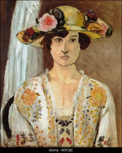 Pour qui posait cette muse au chapeau à fleurs ?