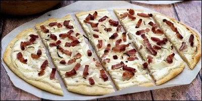 Quel plat traditionnel alsacien se compose d'une pâte à pain garnie de crème, de lardons et d'oignons ?