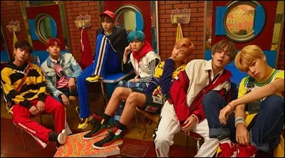 Quel est le nom du membre des 2NE1 que Jin préfère ?