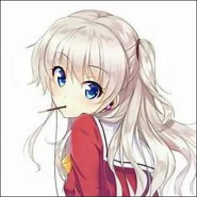 Que tient-elle dans sa bouche ?