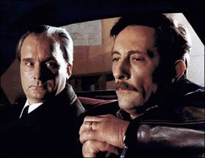 Dans quel film est-il le commissaire divisionnaire Lelong qui enquête sur une opération de l'OAS financée par un hold-up ?