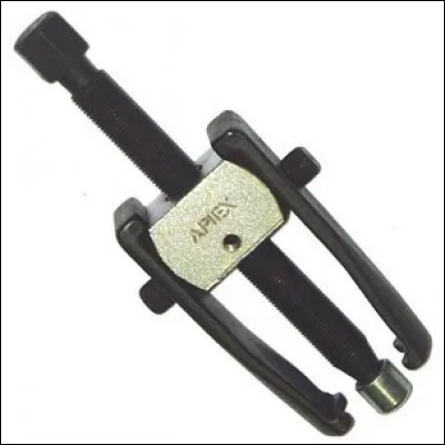 Je suis indispensable pour démonter un roulement à billes. Que suis-je ?