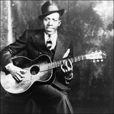 Dans quel genre musical se sont illustr&eacute;s Robert Johnson et Muddy Waters ?