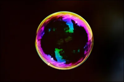 Avec quoi des agents recouvre-t-il Springfield dans le film des Simpson ?