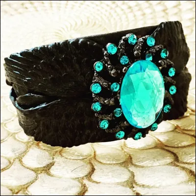 Comment se nomme le bracelet que portent les jeunes elfes pour ne pas se désartibuler durant un saut ?