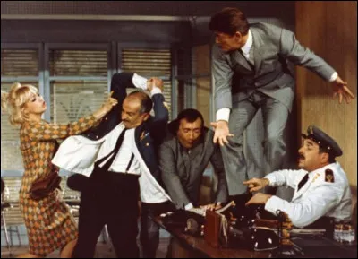 Dans quel film un criminel changeant son apparence est-il pourchassé par un policier ?