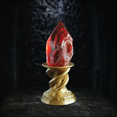 Quels obstacles sont postés pour protéger la pierre philosophale ?