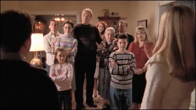 Quelle est la particularité de la famille de la petite amie de Malcolm ?