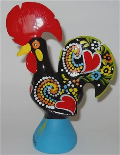 Voici un beau coq que j'ai ramené pour ma petite sur. De quel pays est-ce que je reviens ?