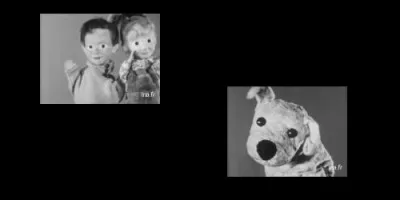 Dans l'émission "L'Antenne est à vous", comment se nommait le chien de ces deux marionnettes qui présentaient l'émission ?