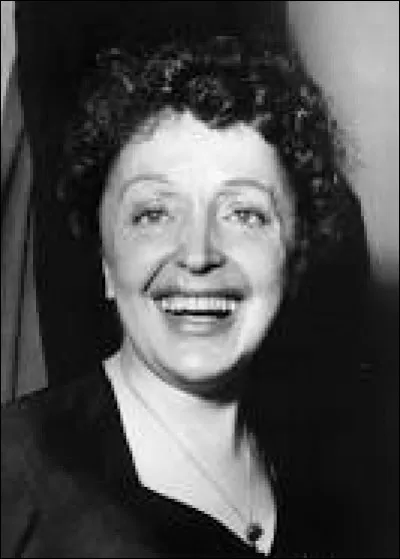 Trouve les paroles de "La vie en rose" d'Édith Piaf : 
Quand il me prend dans ses bras
Qu'il me parle tout bas
Je vois la vie en rose
Il me dit des mots d'amour ...