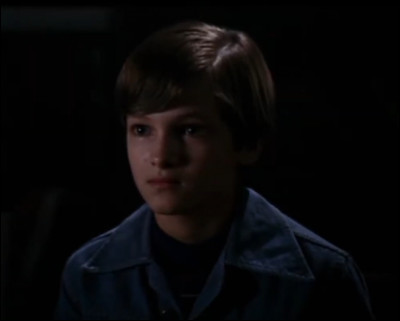 Au début du premier film, qui raconte au petit Ben l'histoire du trésor ?
