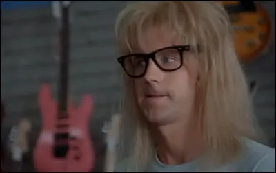 De quel instrument Garth joue-t-il au magasin de musique ?