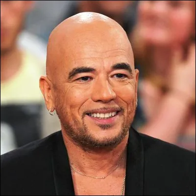 Dans quelle chanson Pascal Obispo dit-il "C'est pas marqu&eacute; dans les livres que le plus important &agrave; vivre est de vivre au jour le jour" ?