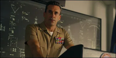 Comment s'appelle cet homme, sous le poste d'enseignant ?