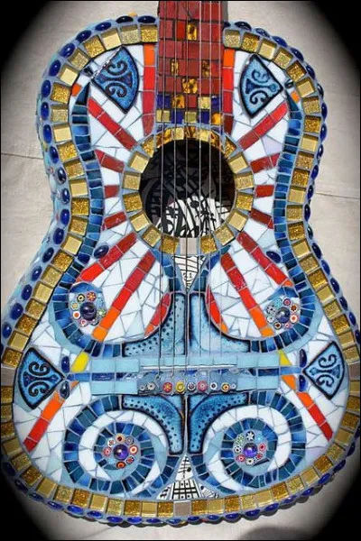 Qui chantait "Le long des autoroutes, il y a de beaux paysages, j'ai ma guitare dans le dos et plus de ronds pour le voyage" ?