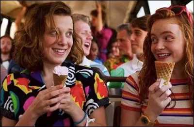 Que révèle Robin à Steve lorsqu'ils sont tous les deux dans les toilettes ?