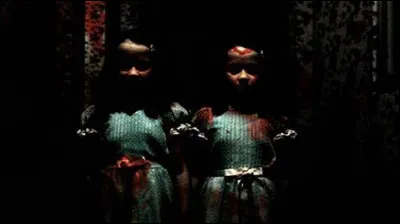 Avec quelle arme Charles Grady a-t-il massacré sa femme et ses filles ?