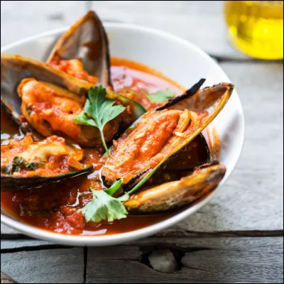 Si on les cuit avec des tomates, à quel mode cuisine-t-on les moules  ?