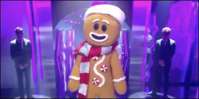 Qui était derrière le costume du pain d'épice et qui a été démasqué en deuxième le mardi 23 août 2022 ?