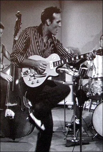 Il est l'interprte de'blue suede shoes ' c'est ... .