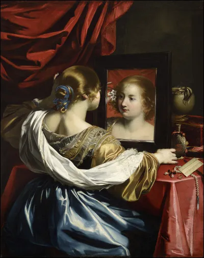 Quel peintre baroque français du XVIIe a réalisé "Femme à son miroir" ?