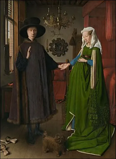 "Les &Eacute;poux Arnolfini" est le nom donn&eacute; &agrave; une peinture sur bois, datant de 1434, du peintre...