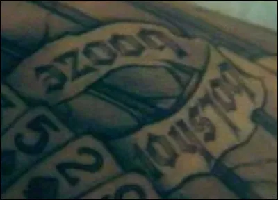 Sur quelle partie du corps Michael possède-t-il ce tatouage "Bolshoi Booze'' ?