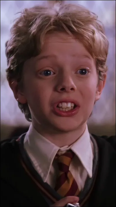 Dans le tome quatre, Colin Crivey tombe dans le lac, dans quoi est-il enroulé ensuite ?