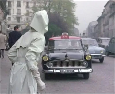 Quel est le modèle d'auto de ce taxi des années 60 ?