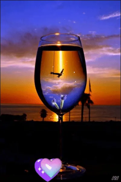 Dans la chanson "Les Démons de Minuit", dans son verre, que regarde-t-il ?