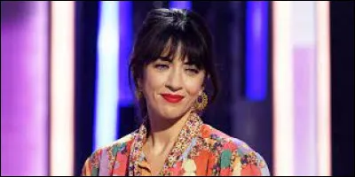 Complétez le titre de cette chanson : "Une femme...