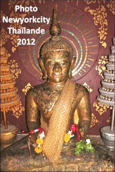 Quel est ce titre en B désignant une personne qui par sa sagesse a réalisé le Nirvana ?