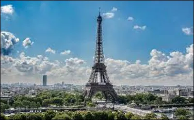 Le 1er avril 1986, que fait croire "Le Parisien" au sujet de la tour Eiffel ?