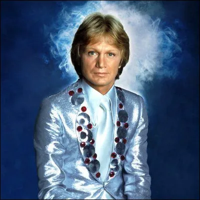 Avec quel titre de 1977, repris dun tube de Peter Allen, Claude François amorce-t-il son virage disco ?