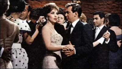 Ayant traversé l'Atlantique, Gina Lollobrigida joue dans le film "Le Rendez-vous de septembre". Elle y tient le rôle d'une jeune femme tombée sous le charme du personnage masculin principal incarné par ...