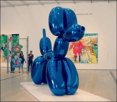 Qui est cet ancien tradeur reconverti dans l'art, mais faisant réaliser ses uvres très connues dans ses ateliers ?