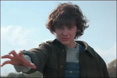 Quand 11 est dans la forêt (dans la S2), quel animal fait-elle cuire dans le feu ?