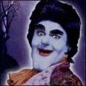 Comment s'appelle l'homme qui transforme les trois jeunes hros de Beetleborgs en super-hros ?