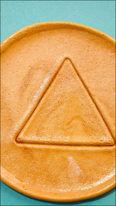 Quelle forme de biscuit le personnage principal a-t-il eu à gratter ?