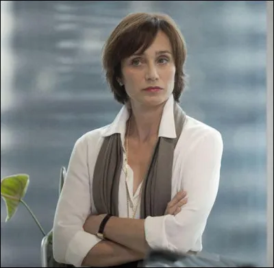 Quel est ce film où Kristin Scott Thomas est la dirigeante d'une branche d'une multinationale ?