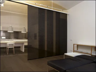 Comment appelle-t-on ce type de séparation coulissante et modulable ?