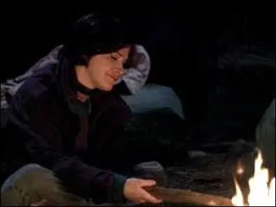 Toujours dans "Un monde de dinosaures" lors de la chaleureuse conversation autour du feu entre Wade et le professeur, quel sujet n'est pas évoqué ?