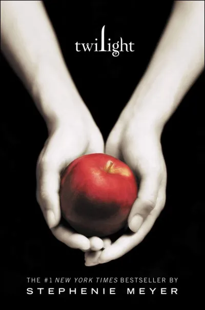 Pourquoi une pomme est présente sur la couverture du premier roman, "Fascination" ?