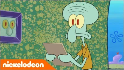 De quelle couleur la chemise de Carlo est-elle ?