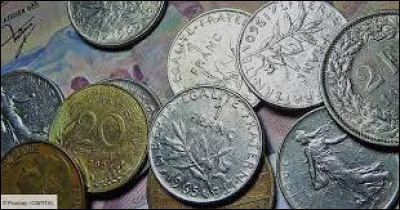 Quel gouvernement prend la décision, en 1948, de dévaluer le franc de 80% ?